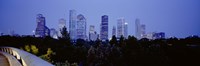 Framed Buildings lit up at dusk, Houston, Texas