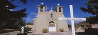 Framed Cross in front of a church, San Francisco de Asis Church, Ranchos De Taos, New Mexico, USA