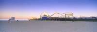 Framed Ferris wheel lit up at dusk, Santa Monica Beach, Santa Monica Pier, Santa Monica, Los Angeles County, California, USA