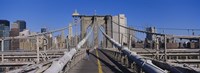 Framed Rear view of a woman walking on a bridge, Brooklyn Bridge, Manhattan, New York City, New York State, USA