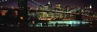 Framed Suspension bridge lit up at dusk, Brooklyn Bridge, East River, Manhattan, New York City, New York State, USA
