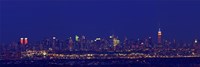 Framed Buildings in a city lit up at night, Upper Manhattan, Manhattan, New York City, New York State, USA