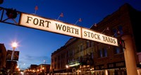 Framed Signboard over a road at dusk, Fort Worth Stockyards, Fort Worth, Texas, USA