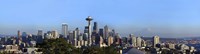 Framed Buildings in a city with mountains in the background, Space Needle, Mt Rainier, Seattle, King County, Washington State, USA 2010