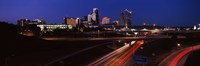 Framed Highway interchange and skyline at dusk, Kansas City, Missouri, USA