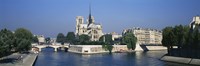 Framed Cathedral along a river, Notre Dame Cathedral, Seine River, Paris, France