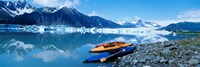 Framed USA, Alaska, Kayaks by the side of a river