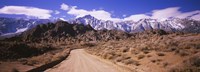 Framed Dirt road passing through an arid landscape, Lone Pine, Californian Sierra Nevada, California, USA