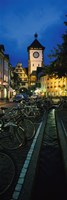 Framed Bicycles parked along a stream near a road, Freiburg, Baden-Wurttemberg, Germany