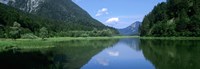 Framed Mountains overlooking a lake, Weitsee Lake, Bavaria, Germany