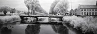 Framed Bridge across a channel connecting Bruges to Damme, West Flanders, Belgium