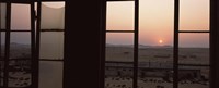 Framed Sunrise viewed through a window, Sperrgebiet, Kolmanskop, Namib Desert, Namibia