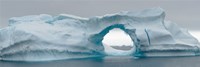Framed Blue iceberg with hole, Antarctica