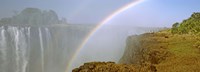 Framed Rainbow form in the spray created by the water cascading over the Victoria Falls, Zimbabwe