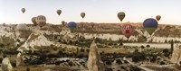 Framed Mulit colored hot air balloons at sunrise over Cappadocia, Central Anatolia Region, Turkey