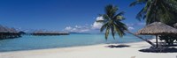 Framed Lounge chair under a beach umbrella, Moana Beach, Bora Bora, French Polynesia