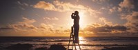 Framed Man Looking Through Binoculars In Silhouette