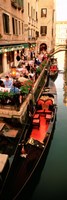 Framed Gondolas moored outside of a cafe, Venice, Italy