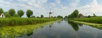 Framed Traditional windmill along with a canal, Damme, Belgium