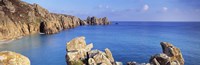 Framed Rock formations at seaside, Logan rock, Porthcurno Bay, Cornwall, England