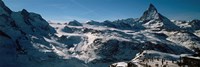 Framed Skiers on mountains in winter, Matterhorn, Switzerland