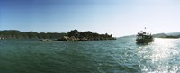 Framed Rocky island and boat in the Mediterranean sea, Sunken City, Kekova, Antalya Province, Turkey