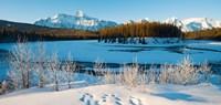 Framed Frozen river with mountain range in the background, Mt Fryatt, Athabaska River, Jasper National Park, Alberta, Canada