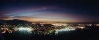 Framed Rio de Janeiro lit up at night viewed from Sugarloaf Mountain, Brazil