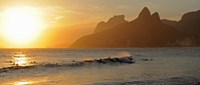 Framed Surfers at sunset on Ipanema Beach, Rio De Janeiro, Brazil