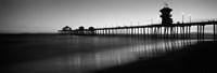 Framed Pier in the sea, Huntington Beach Pier, Huntington Beach, Orange County, California (black and white)