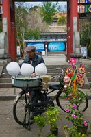 Framed Candy Floss Vendor selling Cotton Candies in Old Town Dali, Yunnan Province, China