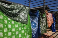 Framed Batik fabric souvenirs at a market stall, Baisha, Lijiang, Yunnan Province, China