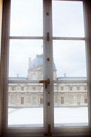 Framed Louvre museum viewed through a window, Paris, Ile-de-France, France