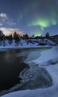 Framed Aurora Borealis over Tennevik River, Troms, Norway