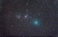 Framed Comet Hartley 2 as it approaches the Double Cluster in Perseus