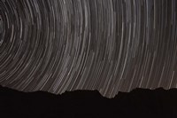 Framed Star trails above a valley in the Firoozkooh area, Iran