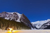 Framed Lake Louise on a clear night in Banff National Park, Alberta, Canada