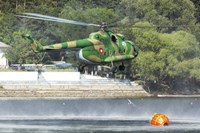 Framed Bulgarian Air Force Mi-17 taking water with Bambi Bucket