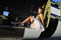 Framed Sexy 1940's style pin-up girl sitting inside of a C-47 Skytrain aircraft