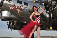 Framed Beautiful 1940's style pin-up girl standing under a B-17 bomber