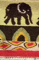 Framed Namibia, Swakopmund. Karakulia, elephant design on wool textiles