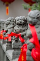 Framed Stone lions with red ribbon, Jade Buddah Temple, Shanghai, China
