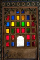 Framed Brightly colored glass window, City Palace, Udaipur, Rajasthan, India.