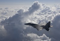Framed F-15 Eagle Fires an AIM-9X Missile