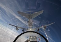 Framed F-16 Flies in the Pre-contact Position Behind a KC-135R Stratotanker