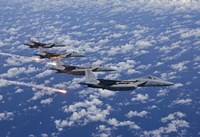 Framed Four F-15 Eagles fly in Formation Over the Pacific Ocean
