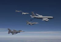 Framed Four F-16's and a KC-135 Fly in Formation over Arizona