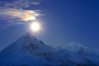 Framed Full moon with Rainbow Clouds over Ogilvie Mountains, Canada