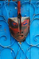 Framed Mask on Callejon de Hamels building walls, Cuba