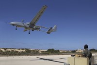Framed IAI Heron Unmanned Aerial Vehicle takes off the runway